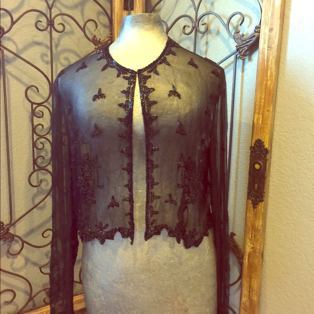 Small woman’s beaded cardigan
